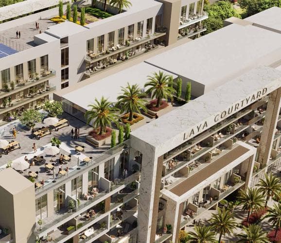 Building facade at Laya Courtyard by Laya Developers in Dubai Studio City