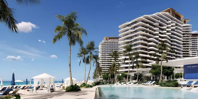 Building facade at Nikki Beach Residences by Aldar Properties in Marjan Island
