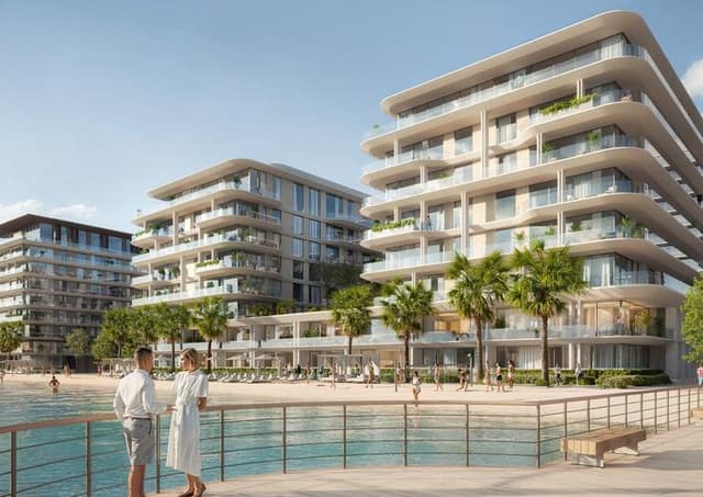 Building facade at Blue Beach Residence by Ajmal Makan Real Estate Development in Ajmal Makan City