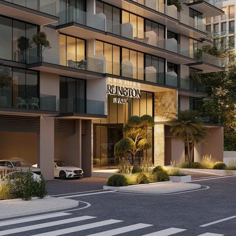Building facade at Arlington Park by Majid Developments in Dubai Land Residence Complex