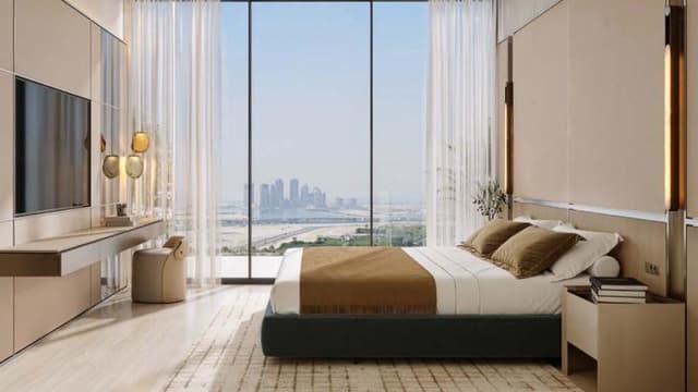 Elegant Binghatti Wraith bedroom featuring floor-to-ceiling windows
