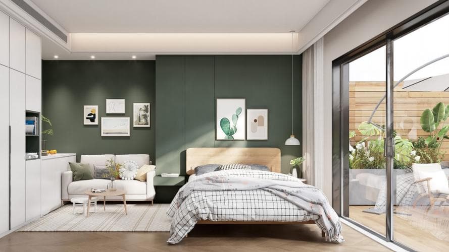 Modern bedroom inside a fully furnished apartment at Forest City Tower II