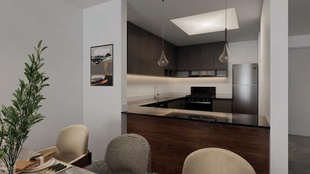 Modern kitchen interior in Azha Al Aamra Residences Ajman apartments